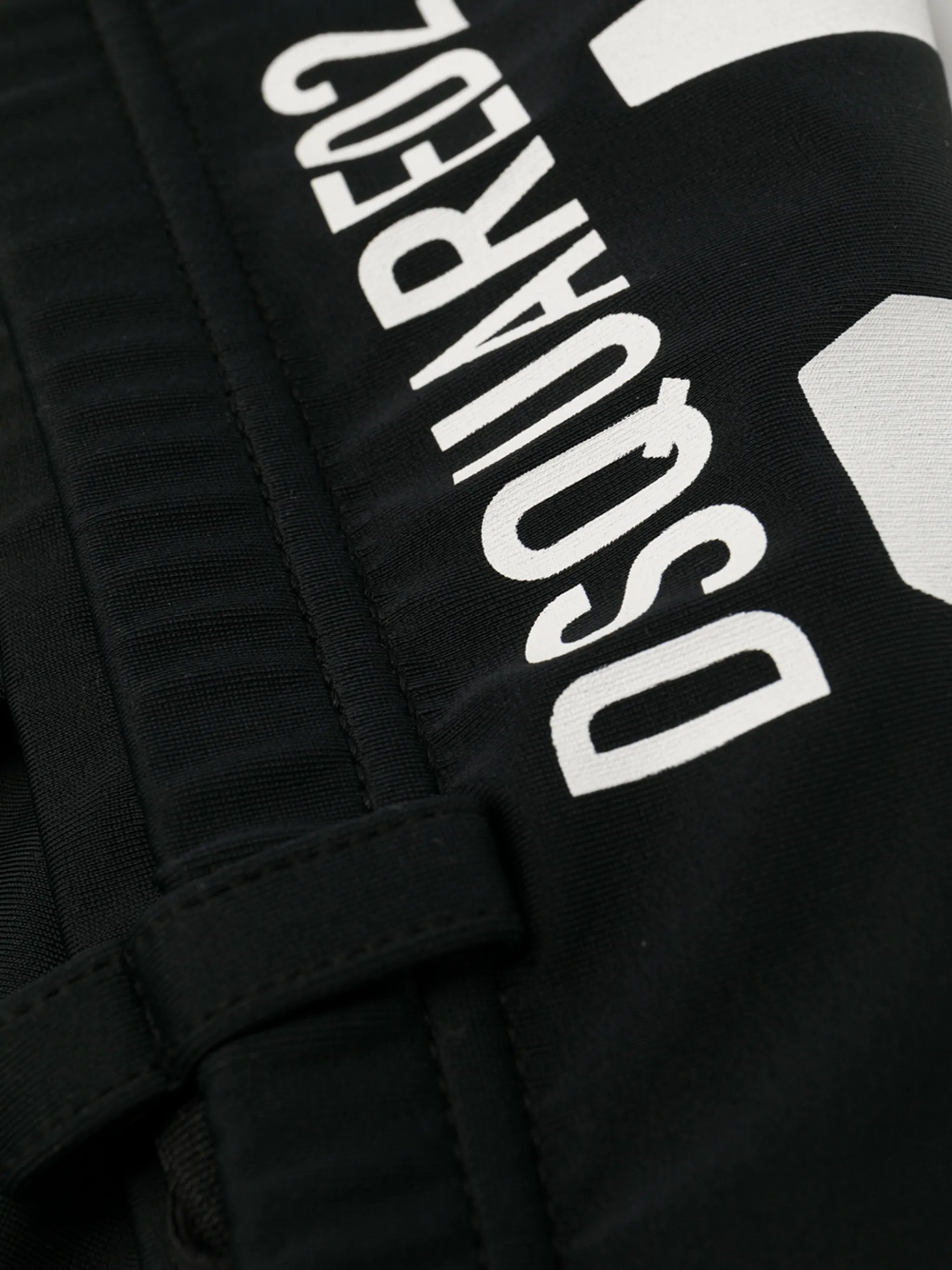 Swim trunks with "Icon" print