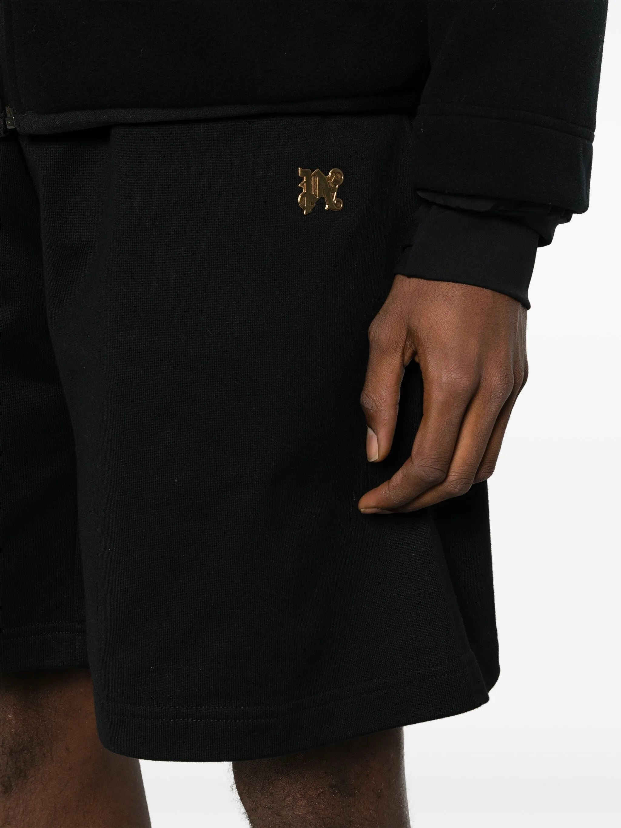 Joggingshorts mit Monogramm-Schild