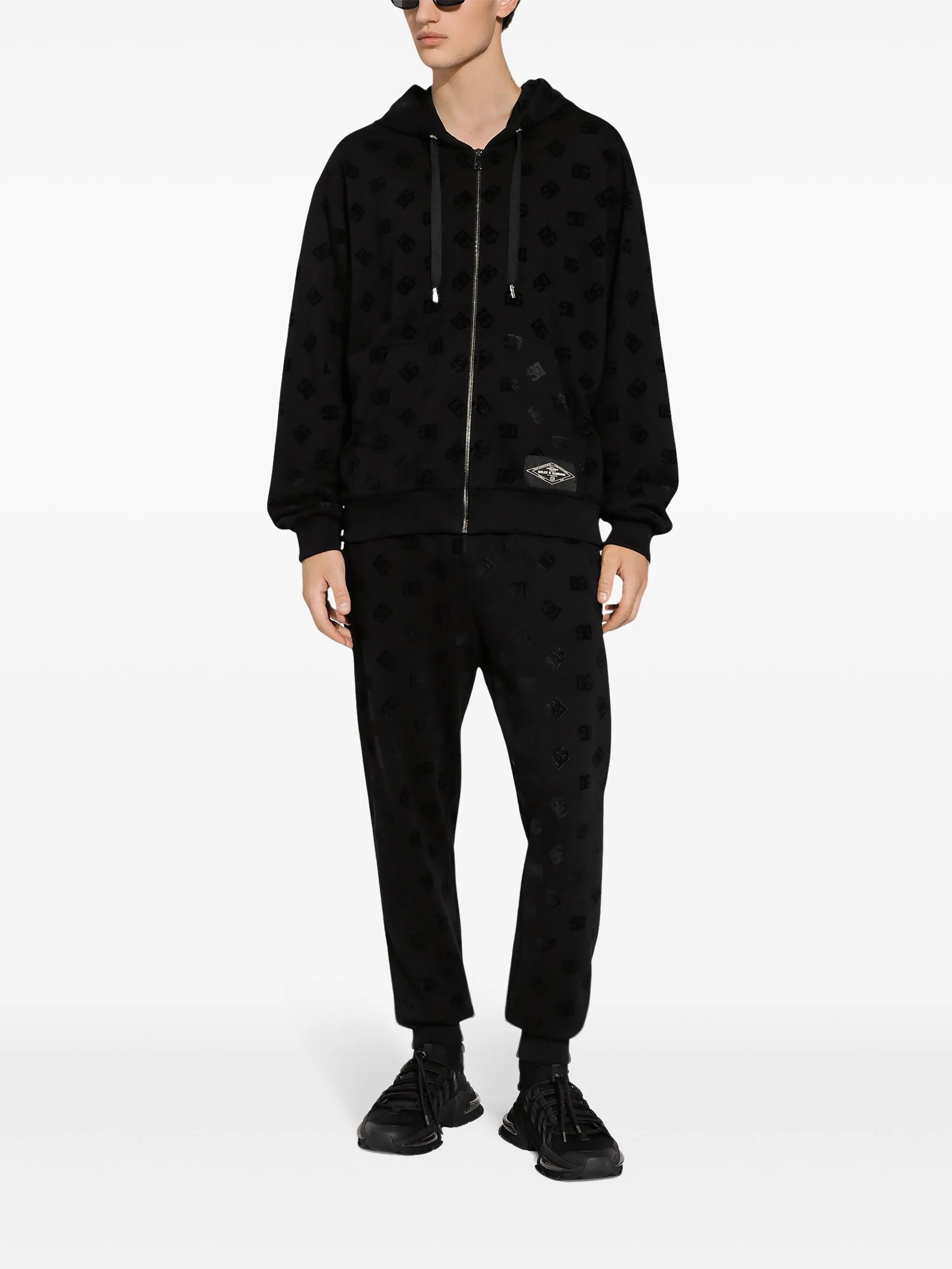 Jogging pants with monogram embossing