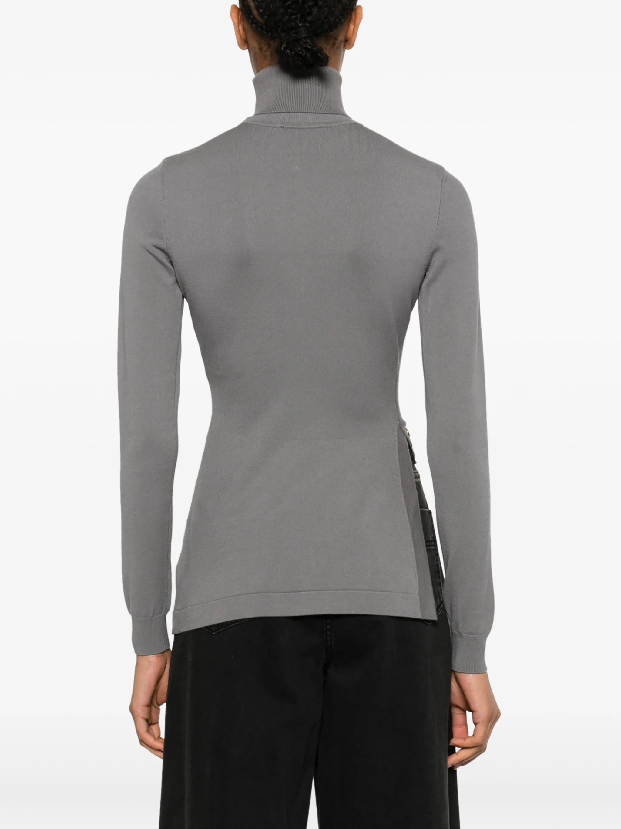 Sweater with decorative buttons