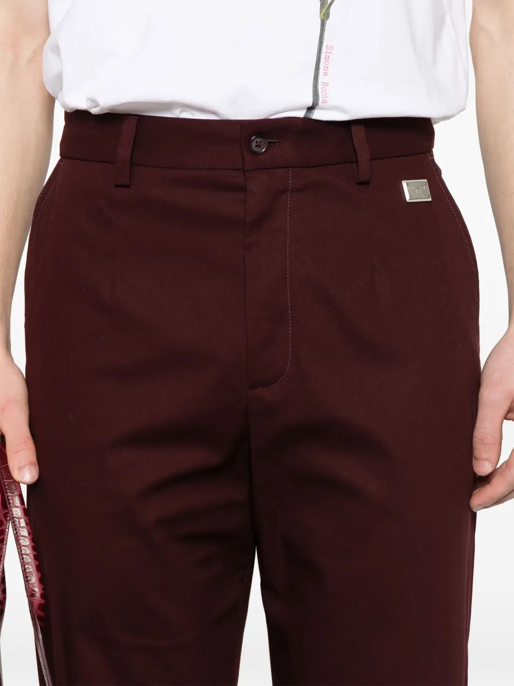 Chino pants with logo patch