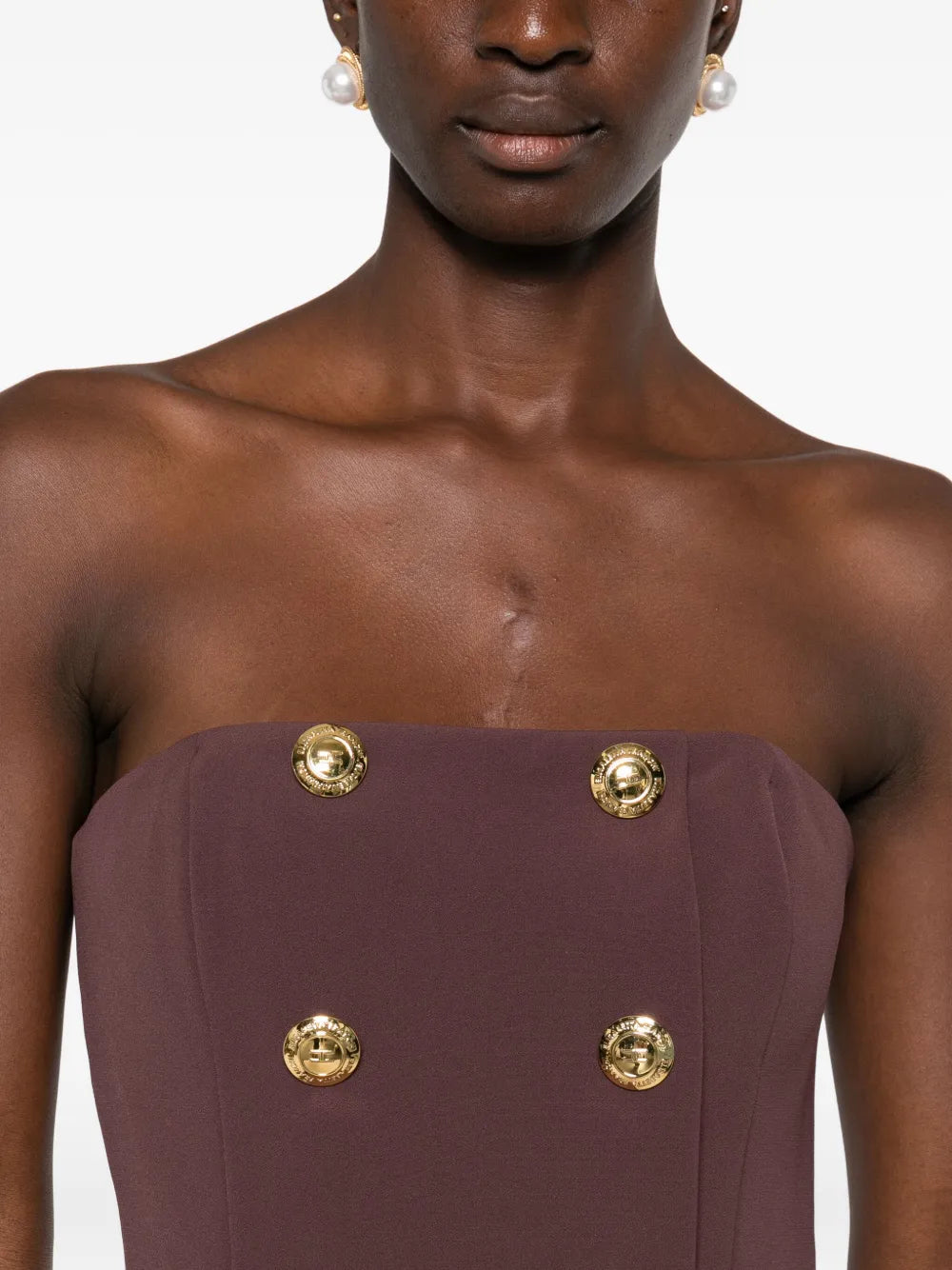 Wrap dress with button decoration