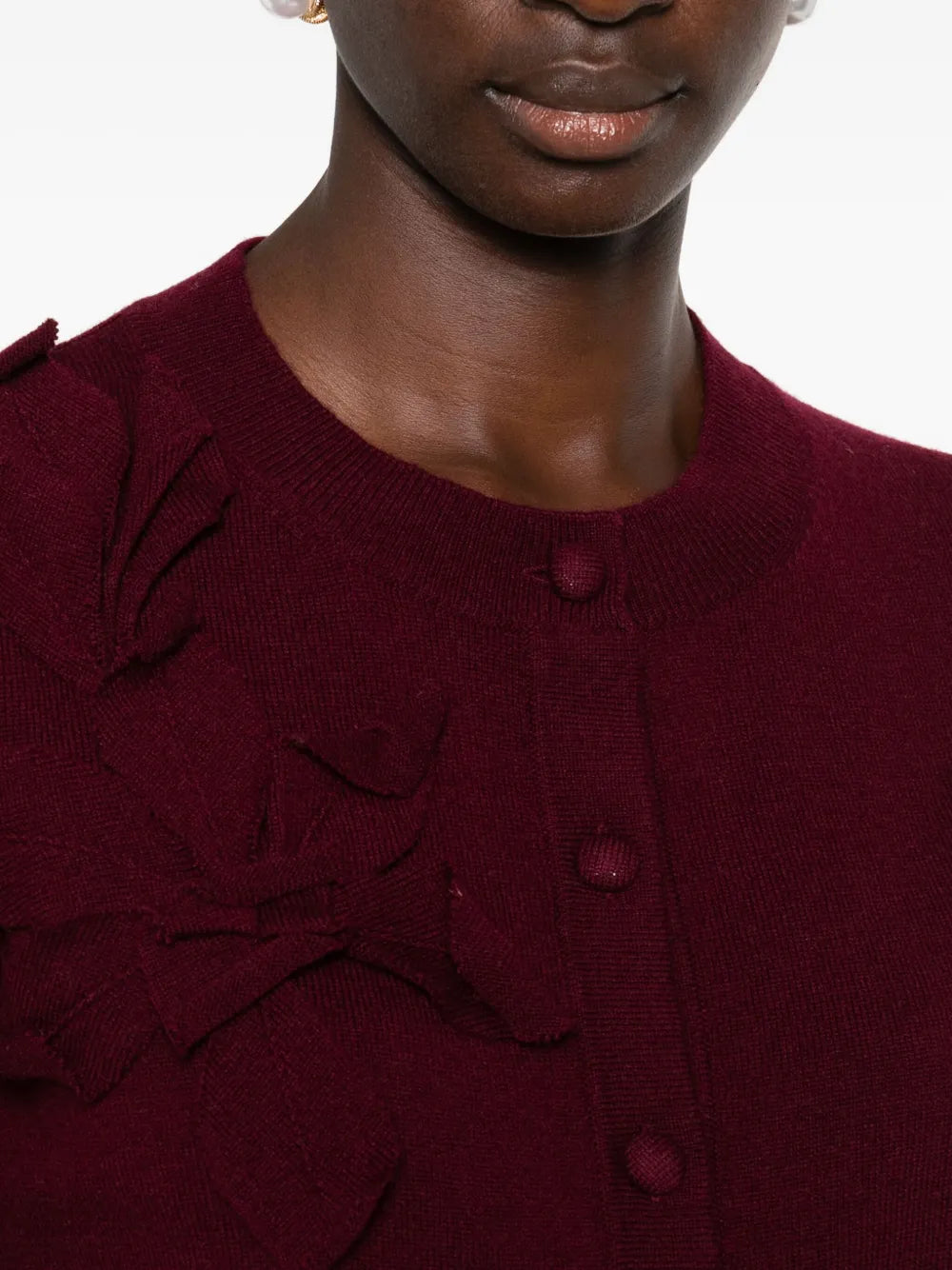 Cardigan with floral embellishment
