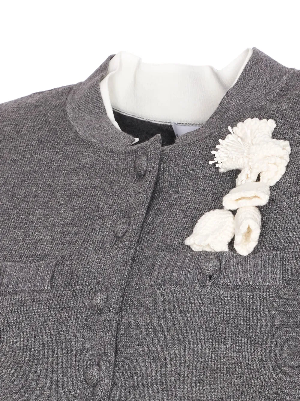 Buttoned cardigan with crochet flower