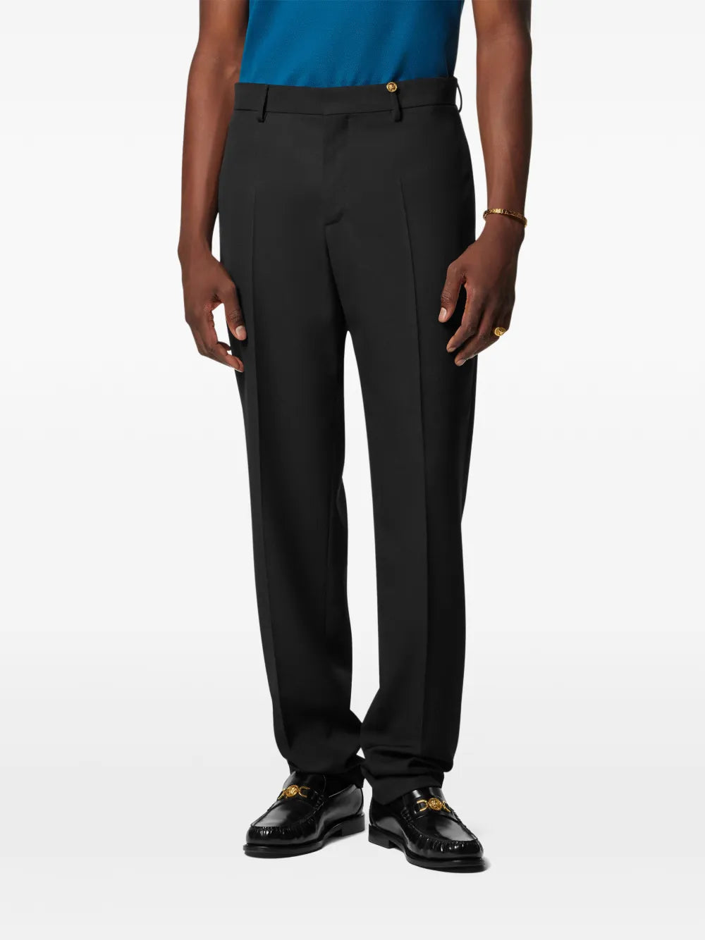 Pants with Medusa buttons