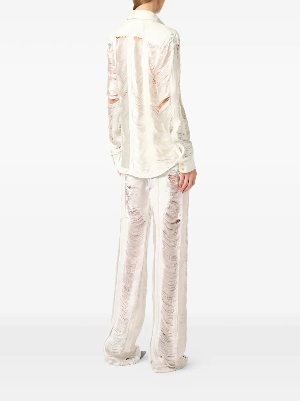 Palazzo jeans in distressed look with fringes