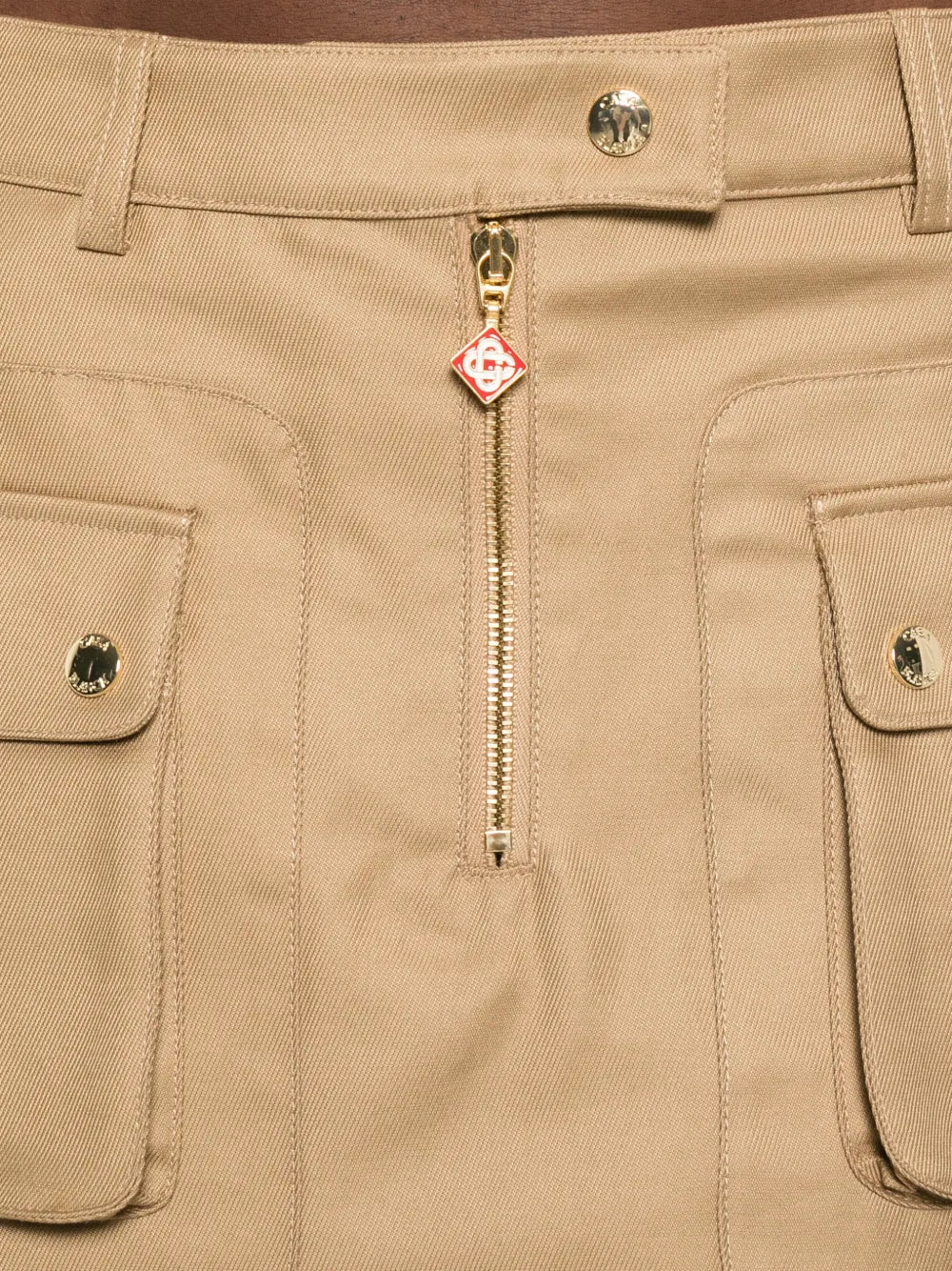 Mini skirt with flap pockets