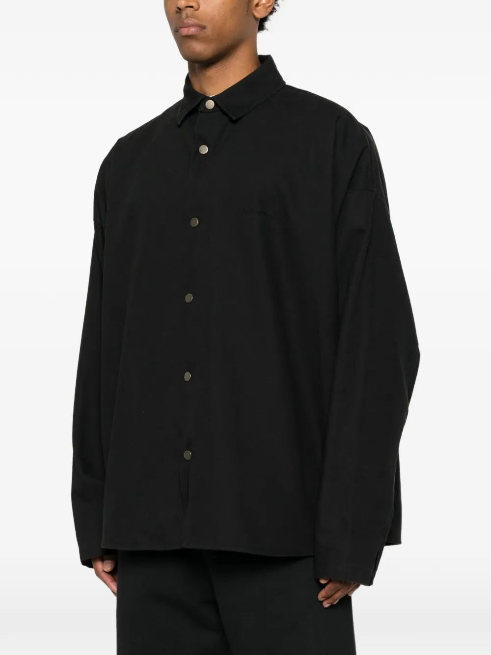 Shirt with snap button closure