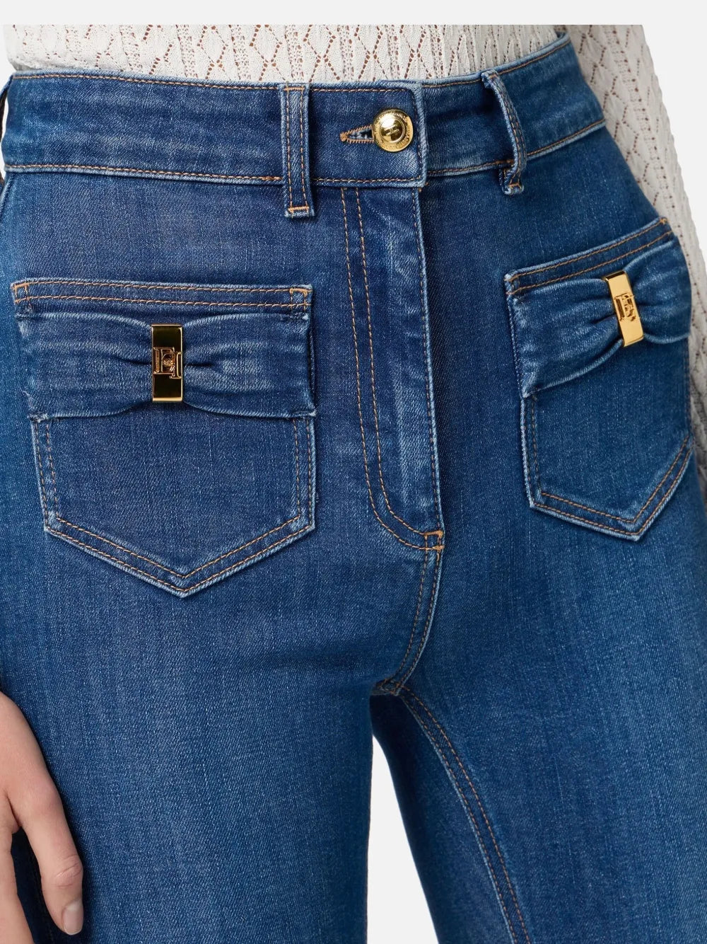 Flared jeans with bow detail