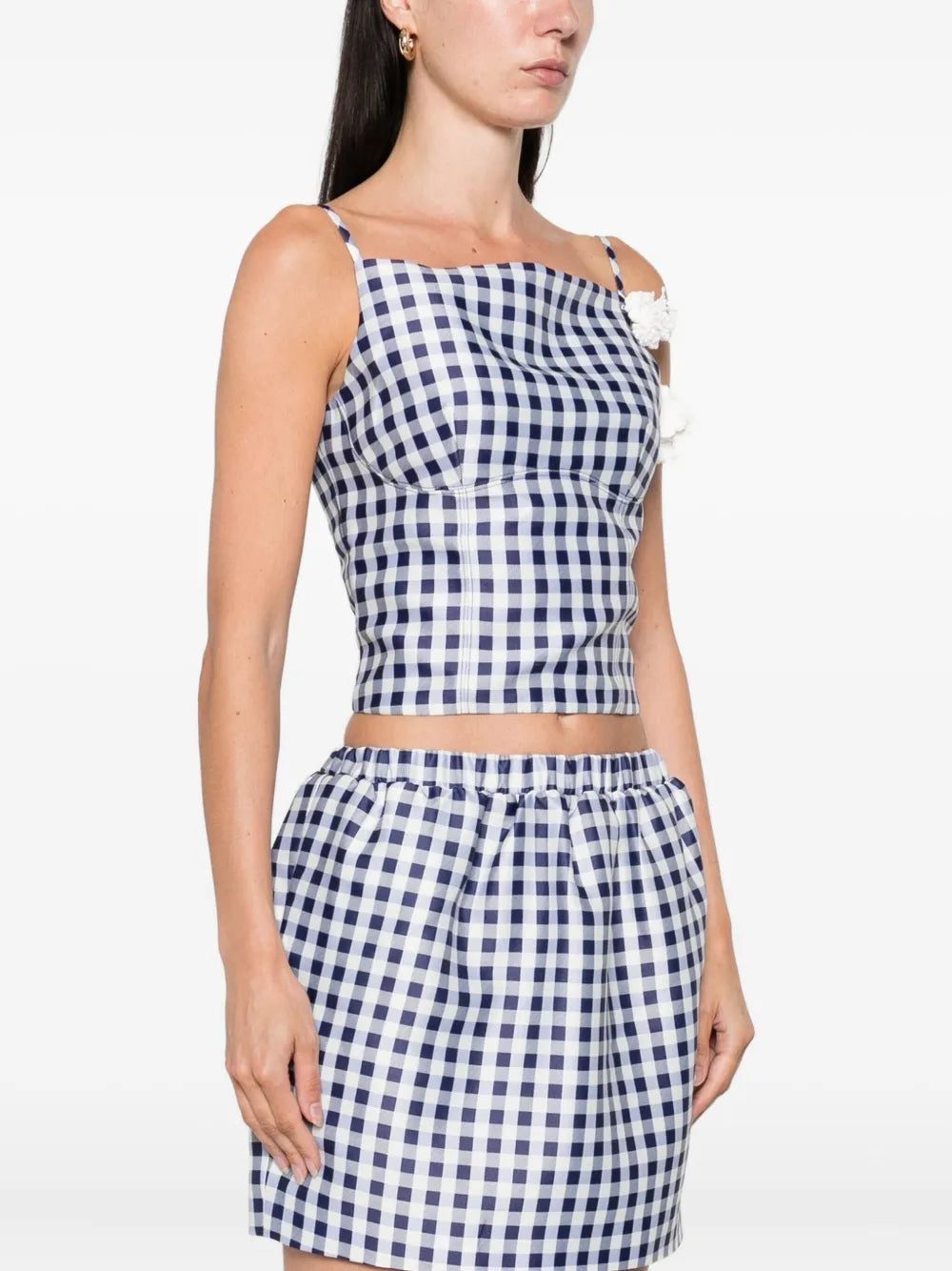 Gingham pattern top with flower applique