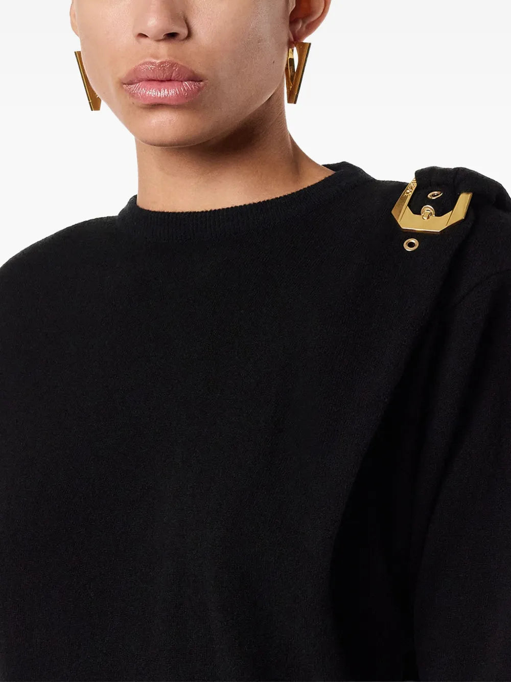 Pullover mit Schnalle