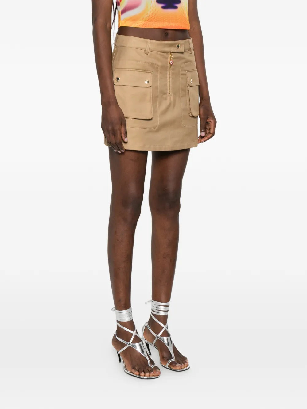Mini skirt with flap pockets